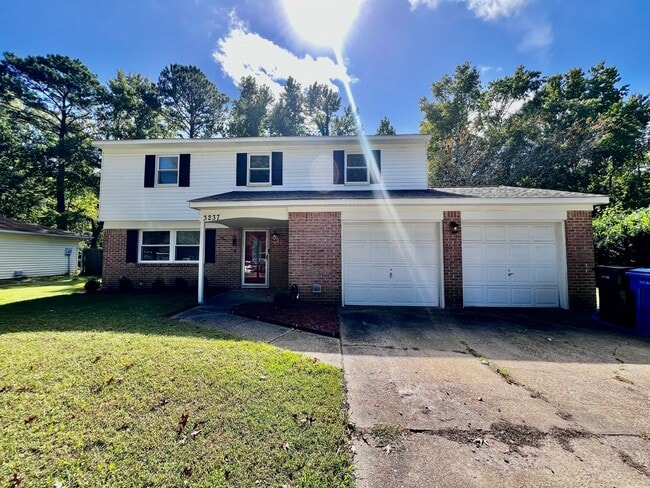 Building Photo - Come see this FULLY renovated two-story tr...