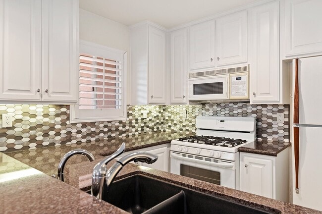 Photo - Ideal Location! El Escorial at East Beach