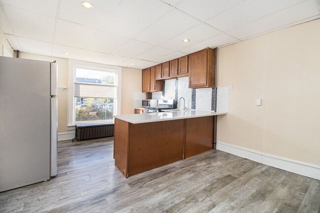 Photo - Spacious 1bed/1bath on main floor of with tons of windows! - Ask about our no security deposit op... Unit 1