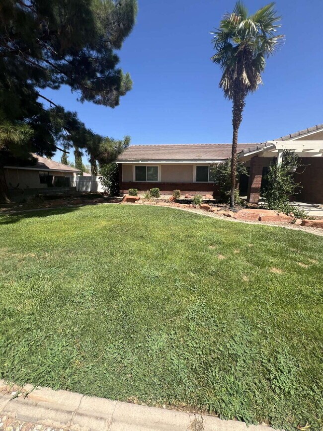 Photo - "Spacious 4-Bed Oasis with 3.5 Baths in Charming St. George!"