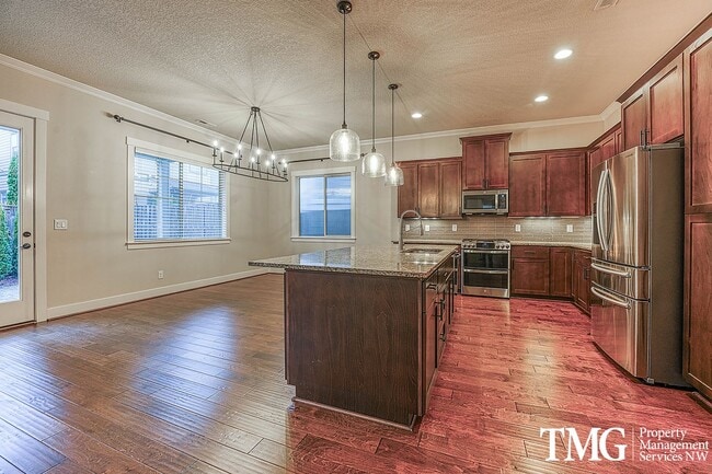 Photo - Spacious 4 BD Home with Private Backyard & Community Amenities!