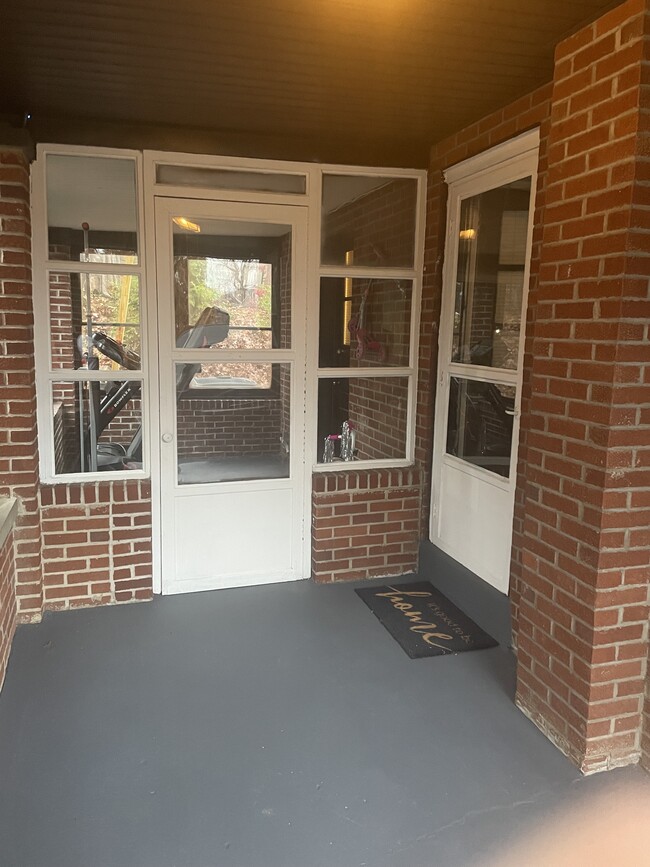 Main entrance and sunroom - 1815 Holly Rd House