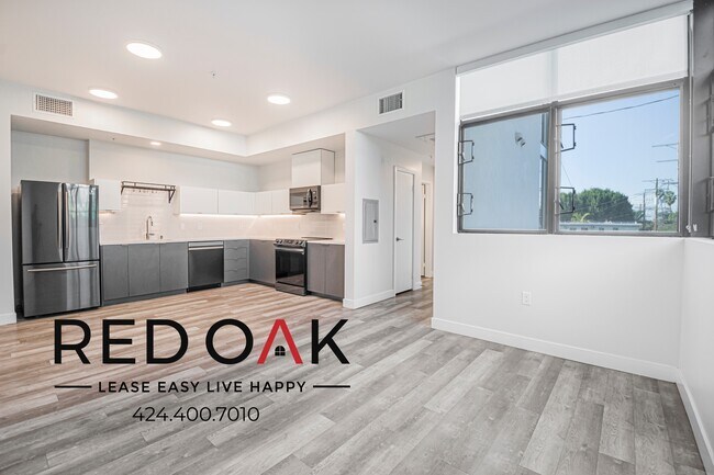 Building Photo - 700 N Spaulding Ave Unit 211