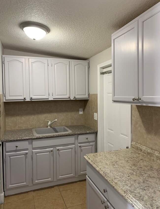 Photo - Spacious 4-Bedroom, 2-Bath Home with Fence...