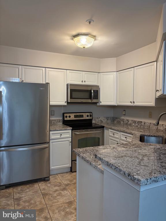 Photo - 5006 Dorsey Hall Dr Apartment Unit A1