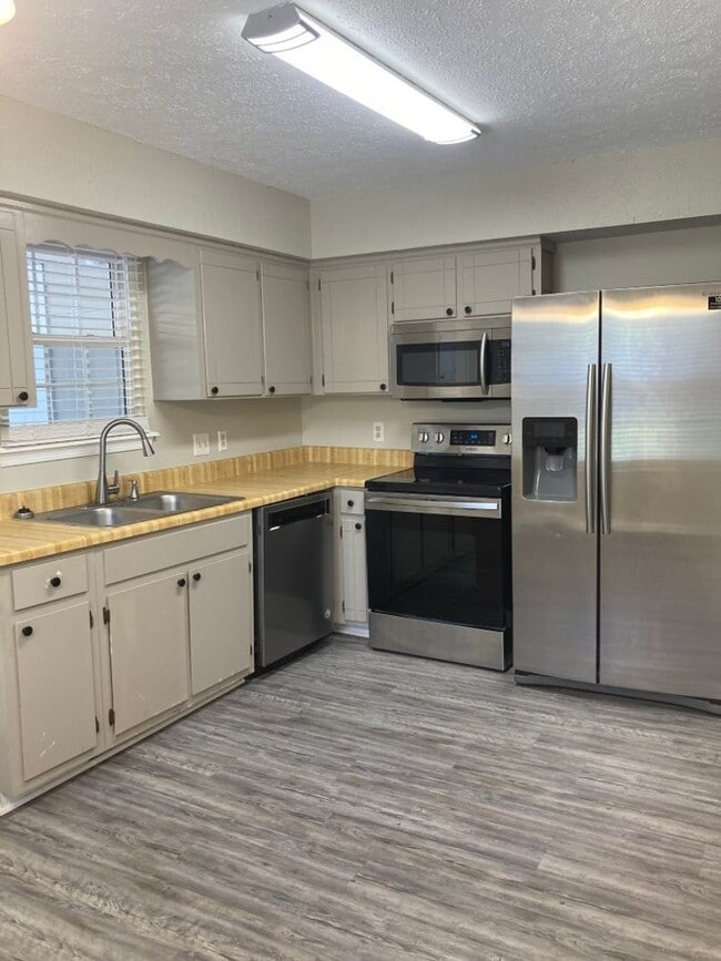 Photo - $500 off this Cute Townhome. Move in by 08/15/2026