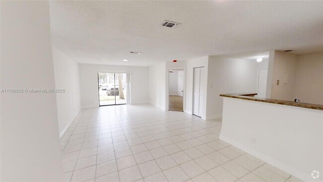 Building Photo - 11255 W Atlantic Blvd Unit 106 Rental