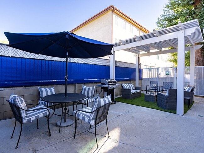 Additional outdoor seating and grilling area.