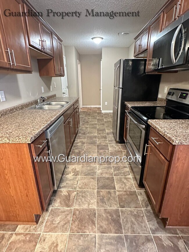 Photo - North Brooklyn Park Town Homes, Dedicated Office, 2 Car Garage, Washer/Dryer, Front Patio