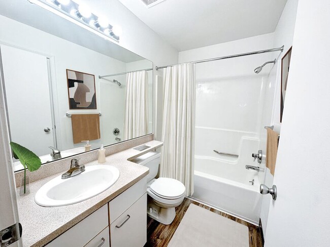 Full Bathroom with Large Mirror