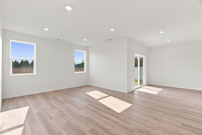 Modern 4-Bedroom Home with a 3-Car Garage & Covered Patio