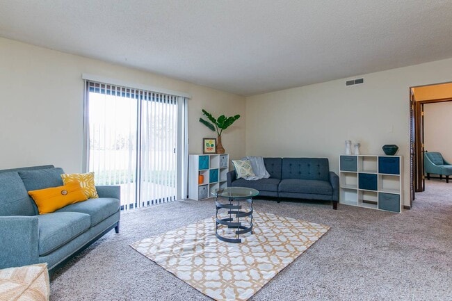 Living Room - 3124, 3128, 3132 Lundin Drive Apartments