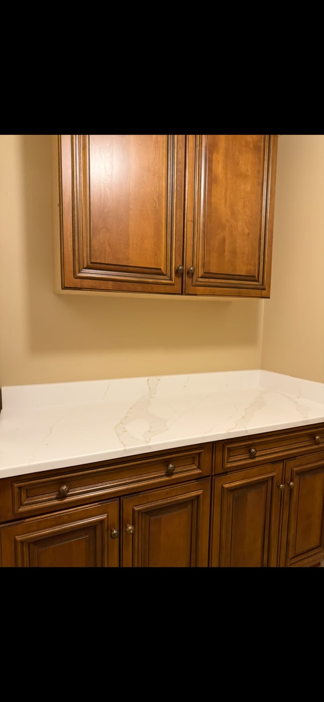 Laundry room with lots of storage - 4043 NW Cinnamon Tree Cir Unit Cinnamon Tree