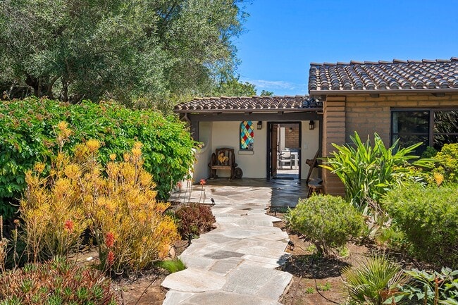 Building Photo - This Beautiful Hacienda Style Home combine...