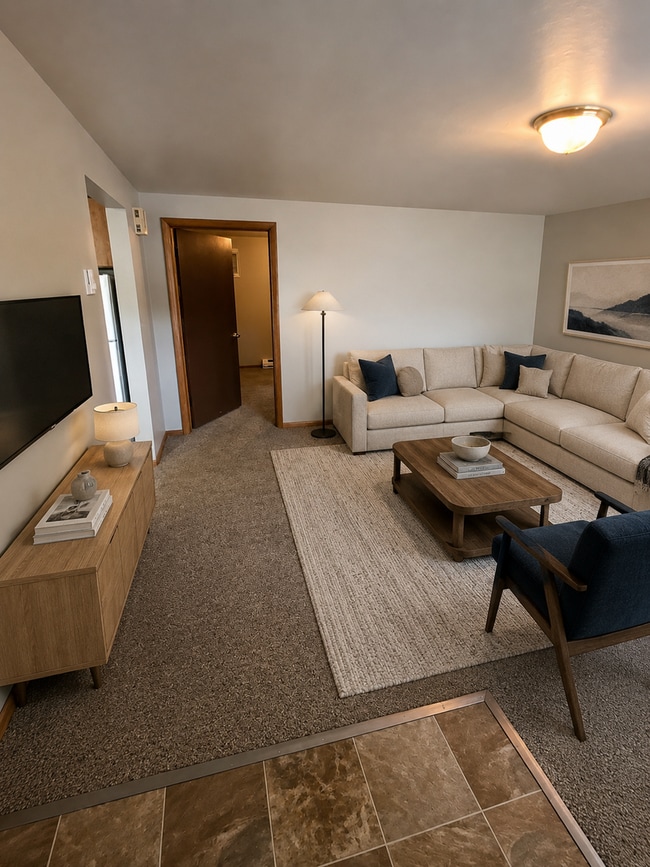 Building Photo - A Home With Not Only Practical Perks, But A Location You’ll Love! Unit 107-1