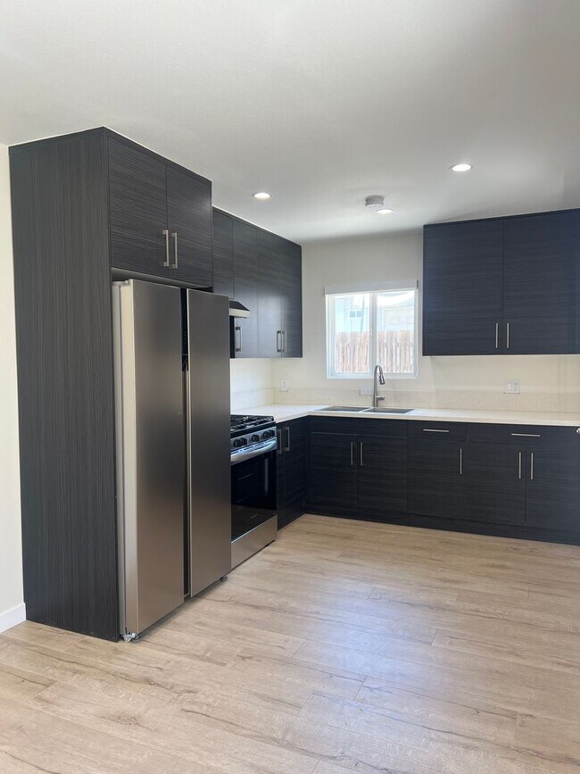 Photo - 14201 Calvert St Unidad 14203 3/4