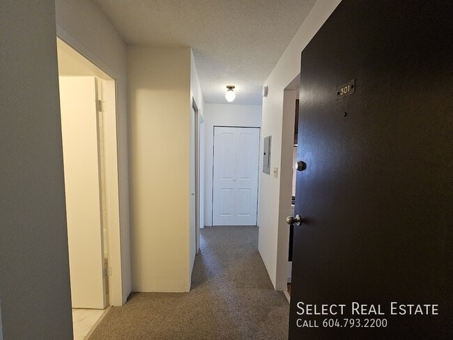 Building Photo - 33924 George Ferguson Way Unit 301