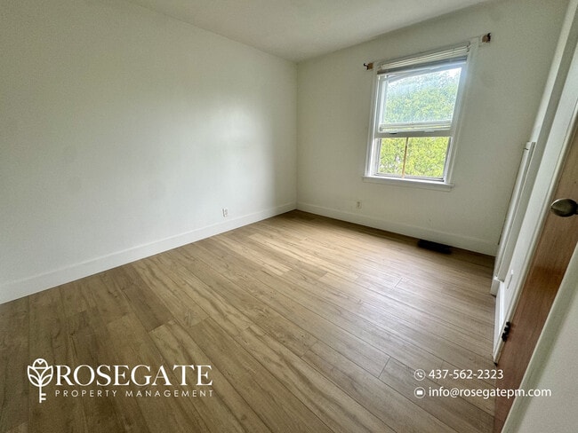 Photo - Cozy 1-Bedroom Apartment with Private Balcony & Parking – Cambridge Unit 5