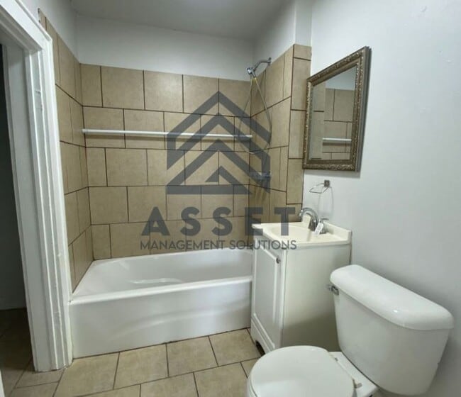 Photo - Modern 1-Bedroom Apartment with Thoughtful Design