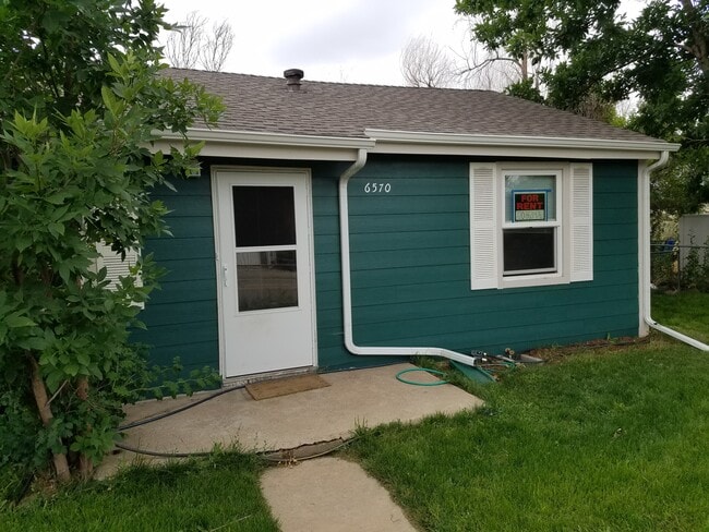 Building Photo - 6570 E 60th Ave Rental