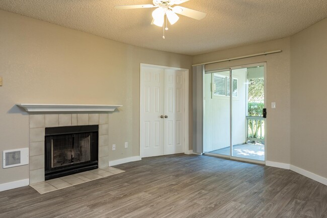 Two Bedroom Den | Living Room with Fireplace