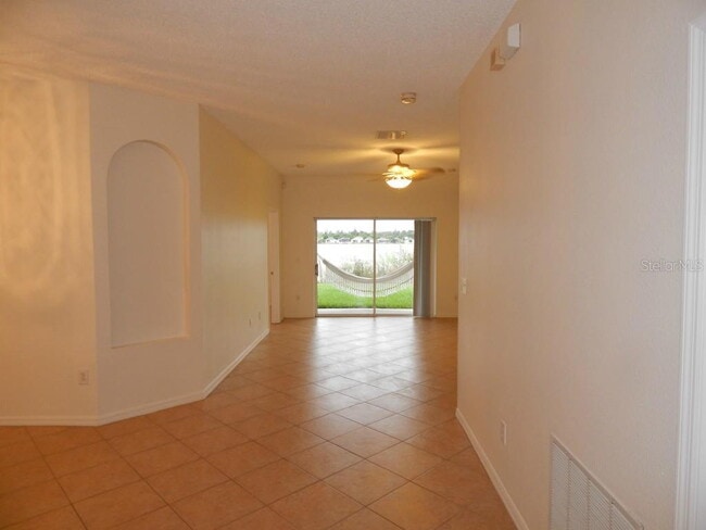 Photo - **Charming 4BR/2BA Pond-View Home with Boat Ramp Access – East Orlando **