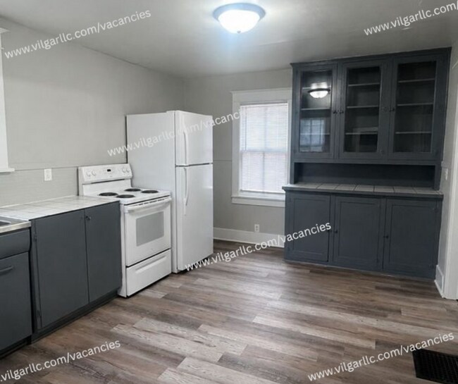 Photo - Step into comfort, convenience, and quality living in this conveniently designed 4-bedroom, 2-flo...