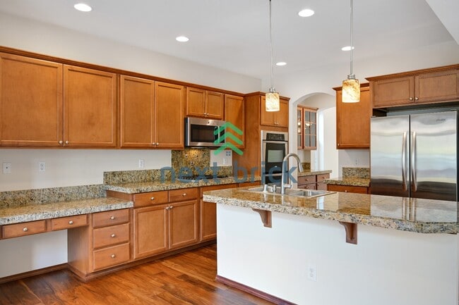"Charming 4-Bed Kenmore Haven: Spacious 2,440 Sq Ft with 2.5 Baths!"
