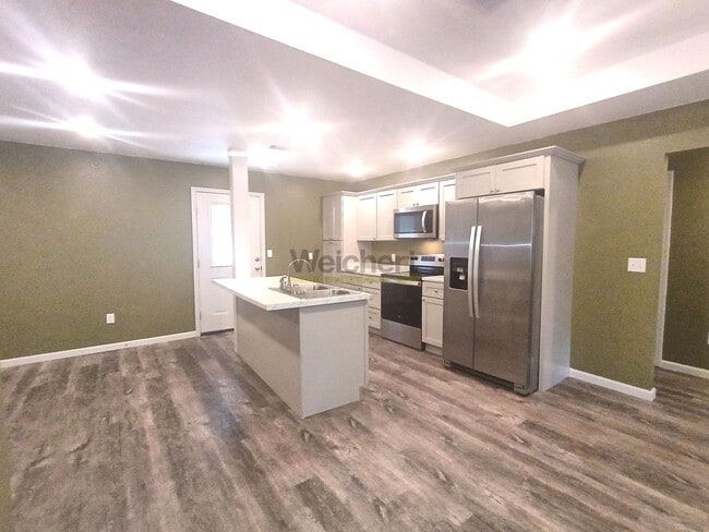 Photo - Modern 4Bed/2Bath house with fenced backyard and garage