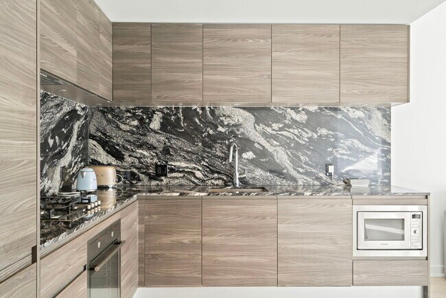 Photo - 310-612 12 Ave SW