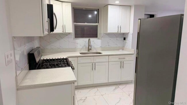 Photo - 70-51 45th Ave