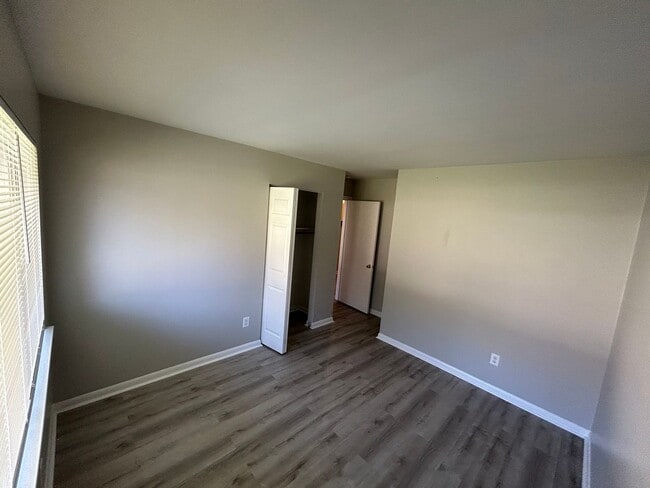 Photo - Charming 3BR Home with Fenced Backyard, Garage & Modern Flooring — 1,322 Sq Ft