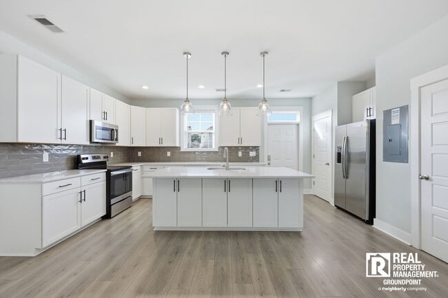 Photo - Oversized Kitchen + Prime Park Circle Location | 2BR Townhome