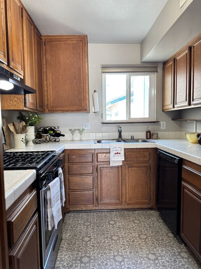 Photo - Charming 2 bed 1.5 bath condo, with attached 2 car garage!