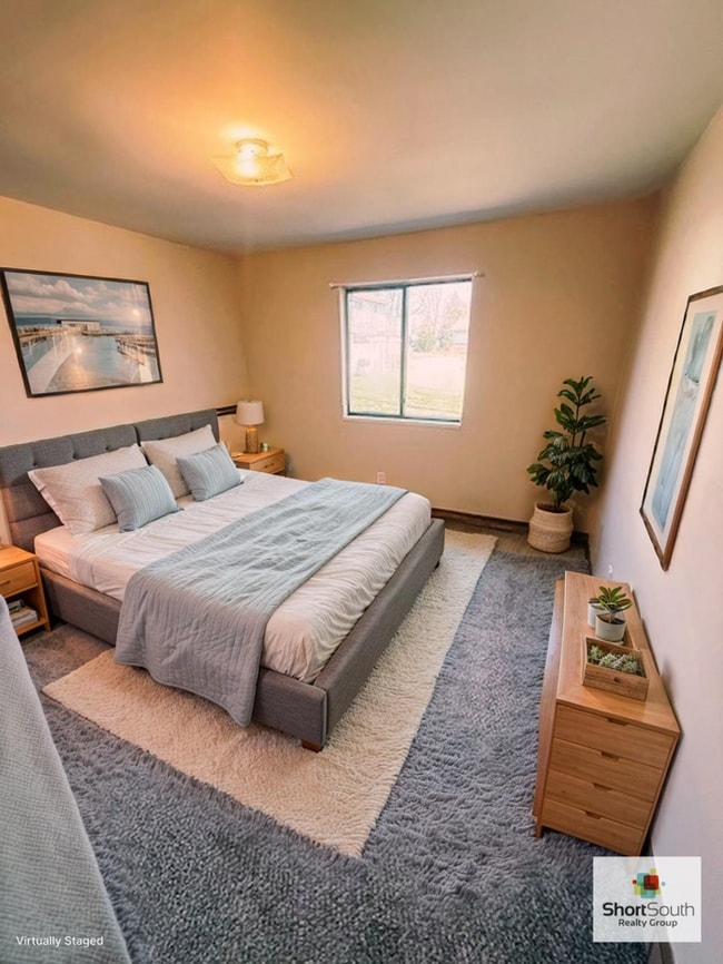 Photo - Updated 2 bed 1 bath main floor apartment with covered detached garage