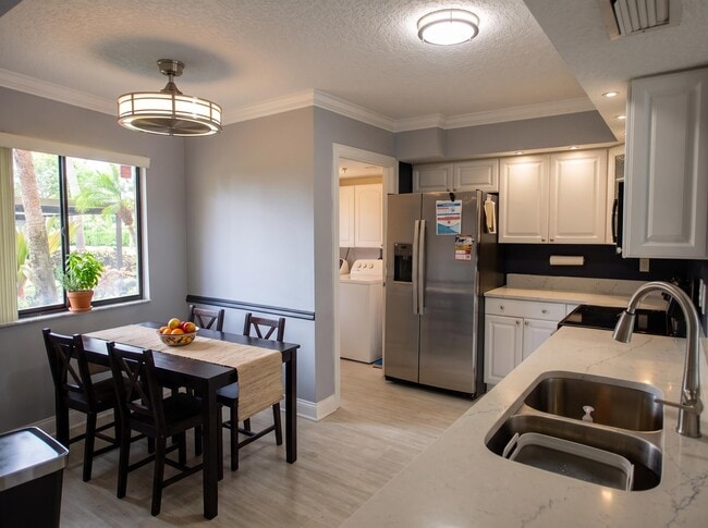 7370 S Oriole Blvd Unit 102