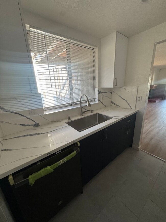 Photo - Beautifully Updated 2BD/2BA Condo | In-Unit Laundry, Garage & Greenbelt Views