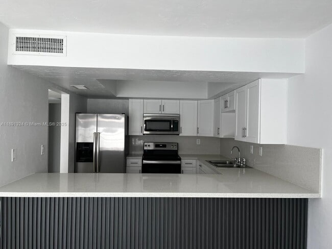 Photo - 7035 W 3rd Ave
