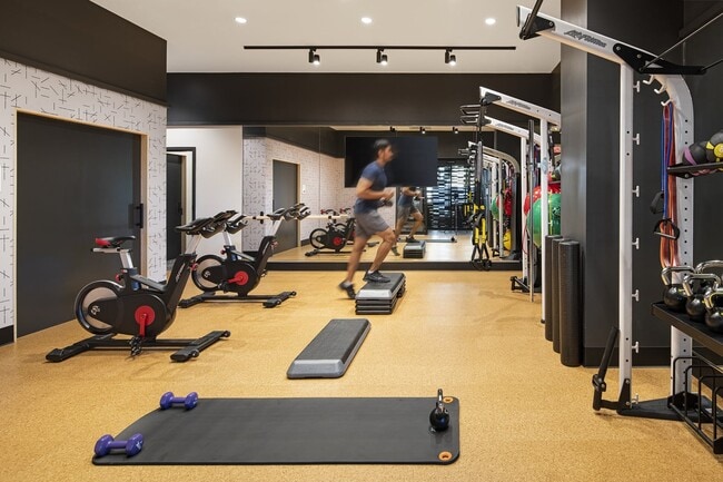 Woodward West's amenities include a fitness center with infrared saunas and workout studio.