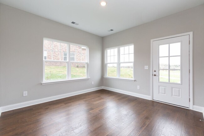 Photo - **BE THE LUCKY ONE TO LIVE IN THIS 2022-BUILT UPSCALE COTTAGE HOME IN THE PRESERVE AT BELLE POINTE**