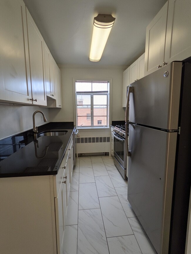 Building Photo - 76 St Paul St Unit 9