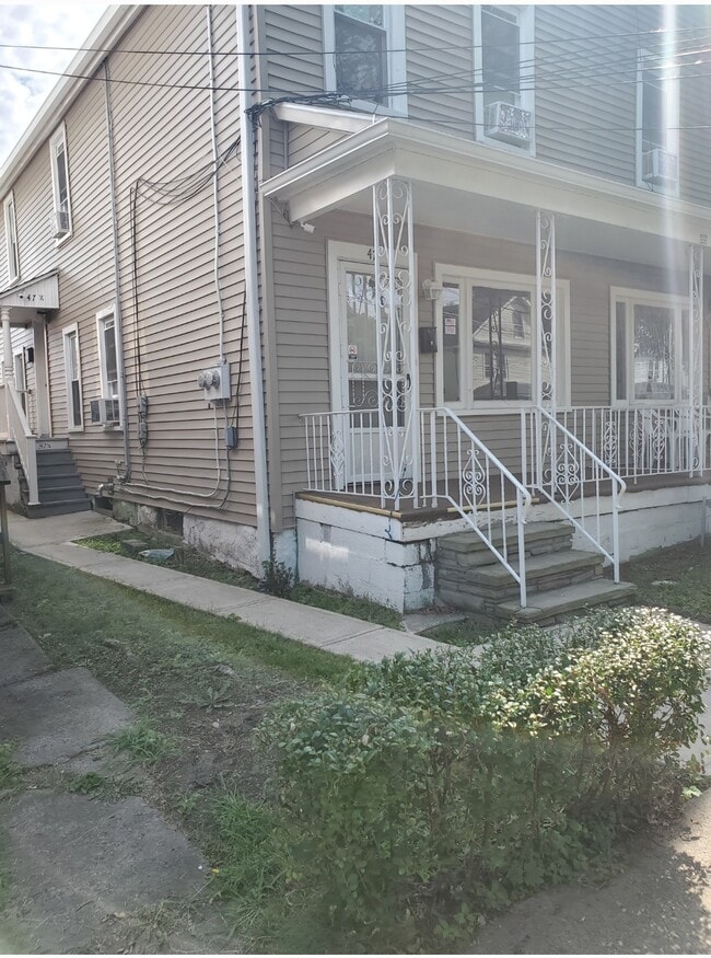 First floor apartment front and rear entrances - 47 Pulaski St Apartments Unit 47
