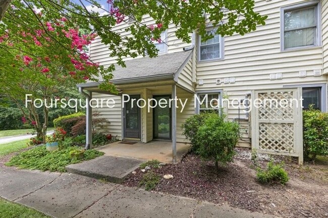 Photo - Charming 1st-Floor End-Unit Condo with Gas Log Fireplace, Private Back Porch & Community Pool – T... Unit 110