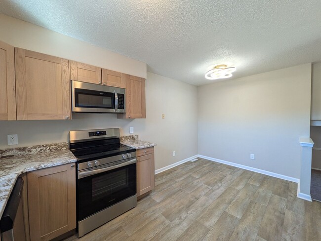 Photo - Pet friendly split-level 3 bedroom, 1 bathroom bi-attached home!