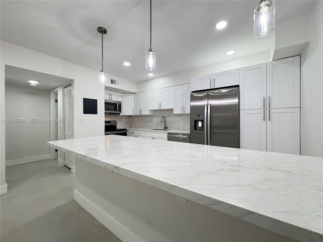 Building Photo - 7913 SW 104th St Unit 107G