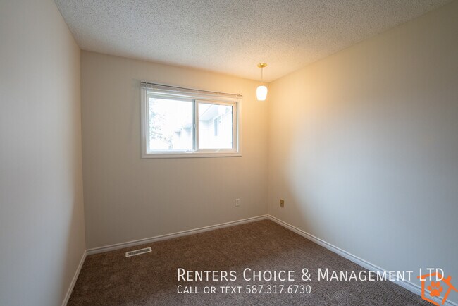 Photo - Townhouse featuring Extra Storage, Assigned Parking & Condo Amenities