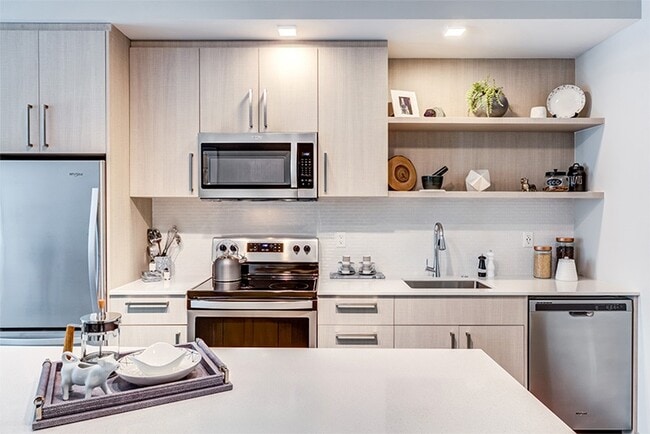 Premium white quartz countertops in kitchens and bathrooms