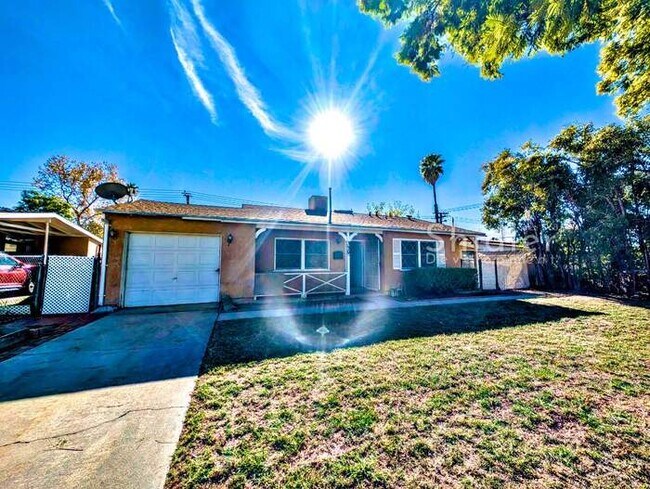 Building Photo - 3 Bedrooms, Big Back Yard, and Right Across from an Elementary School in North San Bernardino