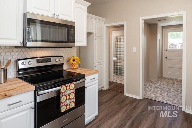 Photo - Charming 2 Bed, 1 Bath Single-Family Home with Large Backyard & RV Hookups!