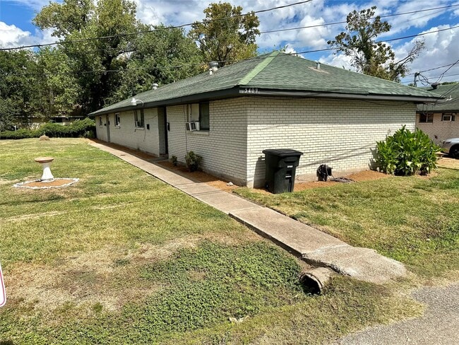 Building Photo - 5409 Suez St Unit 4